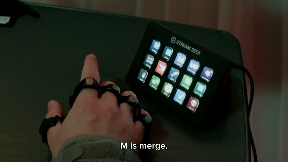 Finger-mounted switches and a Stream Deck: “M is merge.”